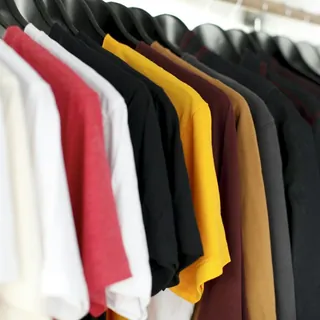 Shirts hanging on a clothing rack