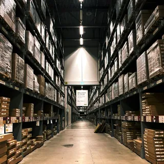 Warehouse shelves stacked with boxes